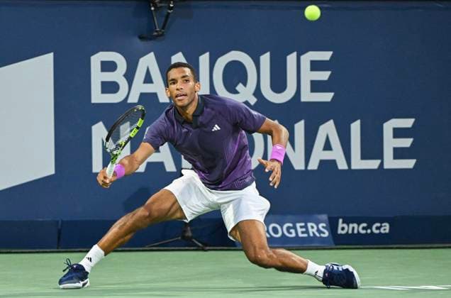 August 7, 2024, Montreal, Pq, Canada: Felix Auger-Aliassime of Canada plays a shot to Flavio Cobolli of Italy during their first round match at the National Bank Open tennis tournament in Montreal, Wednesday, August 7, 2024. Flavio Cobolli, Félix Auger-Aliassime,  - ZUMAc35_ 20240807_zaf_c35_249 Copyright: xGrahamxHughesx