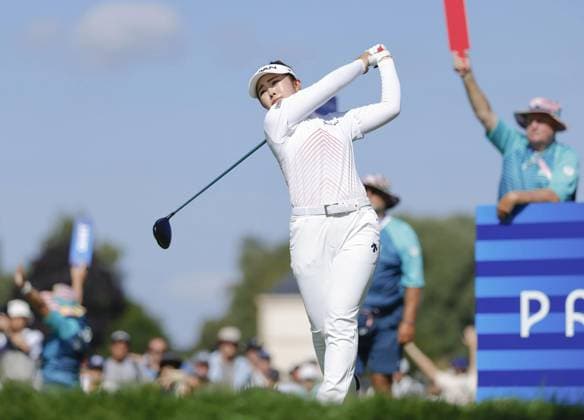 Paris Olympics: Golf Japan s Miyu Yamashita hits off the fourth tee during the second round of the women s golf event at the Paris Olympics on Aug. 8, 2024, at Le Golf National in Saint-Quentin-en-Yvelines, France.  A14AA0003260989P