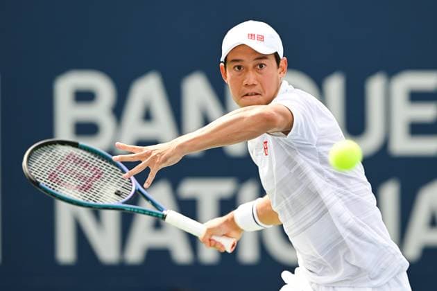 MONTREAL, QC - AUGUST 08: Kei Nishikori (JPN) returns the ball during a second round match at ATP, Tennis Herren National Bank Open on August 08, 2024 at IGA Stadium in Montreal, QC (Photo by David Kirouac Icon Sportswire) TENNIS: AUG 08 National Bank Open EDITORIAL USE ONLY Icon240808001