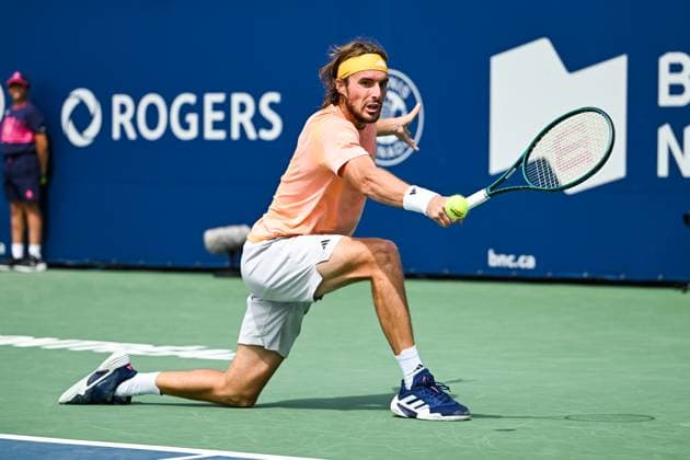 MONTREAL, QC - AUGUST 08: Stefanos Tsitsipas (GRE) returns the ball during a second round match at ATP, Tennis Herren National Bank Open on August 08, 2024 at IGA Stadium in Montreal, QC (Photo by David Kirouac Icon Sportswire) TENNIS: AUG 08 National Bank Open EDITORIAL USE ONLY Icon240808004