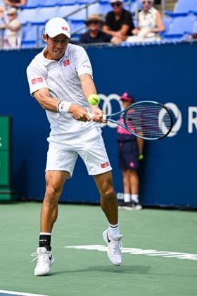 MONTREAL, QC - AUGUST 08: Kei Nishikori (JPN) returns the ball during a second round match at ATP, Tennis Herren National Bank Open on August 08, 2024 at IGA Stadium in Montreal, QC (Photo by David Kirouac Icon Sportswire) TENNIS: AUG 08 National Bank Open EDITORIAL USE ONLY Icon240808007