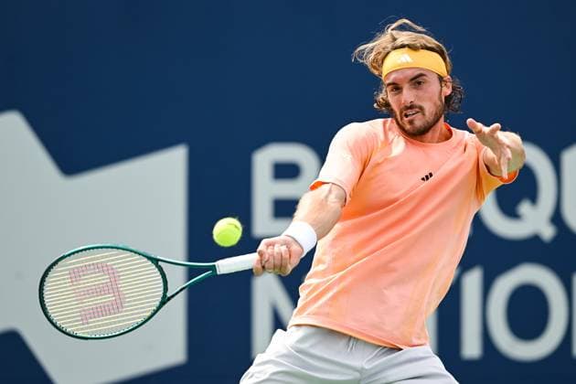MONTREAL, QC - AUGUST 08: Stefanos Tsitsipas (GRE) returns the ball during a second round match at ATP, Tennis Herren National Bank Open on August 08, 2024 at IGA Stadium in Montreal, QC (Photo by David Kirouac Icon Sportswire) TENNIS: AUG 08 National Bank Open EDITORIAL USE ONLY Icon240808011