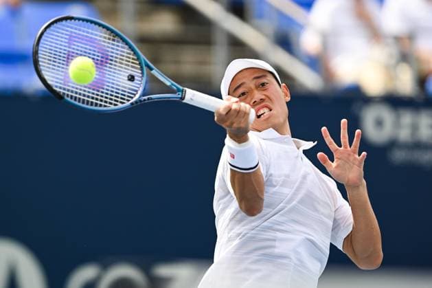 MONTREAL, QC - AUGUST 08: Kei Nishikori (JPN) returns the ball during a second round match at ATP, Tennis Herren National Bank Open on August 08, 2024 at IGA Stadium in Montreal, QC (Photo by David Kirouac Icon Sportswire) TENNIS: AUG 08 National Bank Open EDITORIAL USE ONLY Icon240808022