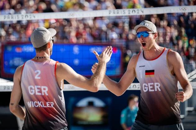 240808 Nils Ehlers and Clemens Wickler of Germany celebrate in a men s Beach volleyball, Beachvolleyball semifinal match between Germany and Norway during day 13 of the Paris 2024 Olympics on August 8, 2024 in Paris. Photo: Jon Olav Nesvold BILDBYRAN COP 217 JE0103 beachvolleyboll beach volleyball sandvolleyball paris 2024 olympics day 13 germany - norway bbeng jubel Copyright: JONxOLAVxNESVOLD BB240808JE069