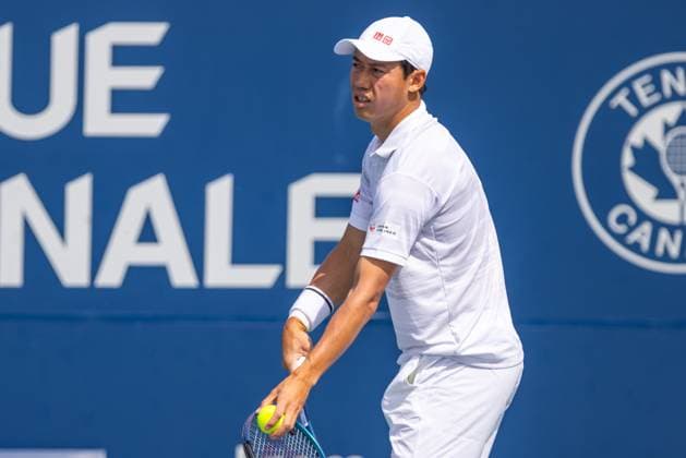 August 8, 2024, Montreal, Quebec, Canada: KEI NISHIKORI from Japan serving in first set against Stefanos Tsitsipas from Greece in second round of Canadian Open at IGA Stadium in Montreal, Quebec, Canada Montreal Canada - ZUMAl189 20240808_zsp_l189_021 Copyright: xYannickxLegarex