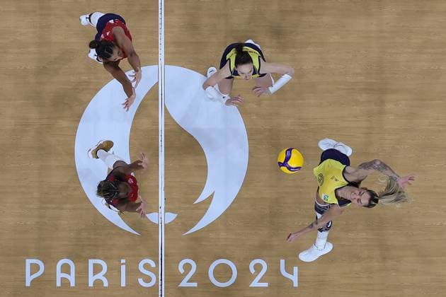 (240808) -- PARIS, Aug. 8, 2024 -- Thaisa Daher de Menezes (R) of Brazil spikes during the women s semifinal of volleyball between Brazil and the United States at the Paris 2024 Olympic Games, Olympische Spiele, Olympia, OS in Paris, France on Aug. 8, 2024. ) (PARIS2024) FRANCE-PARIS-OLY-VOLLEYBALL XuxZijian 
