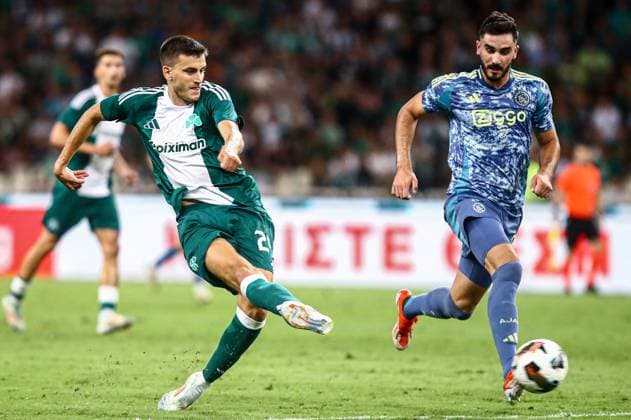 2024-08-08 Panathinaikos FC v AFC Ajax - Europa League Qualifier Third Round - 1st leg ATHENS, NETHERLANDS - AUGUST 8: Alexander Jeremejeff of Panathinaikos FC makes a pass, Josip Sutalo of AFC Ajax during the Europa League Qualifier Third Round - 1st leg match between Panathinaikos FC and AFC Ajax at Olympic Stadium Spyridon Louis on August 8, 2024 in Athens, Netherlands. Athens Olympic Stadium Spyridon Louis Netherlands Content not available for redistribution in The Netherlands directly or indirectly through any third parties. Copyright: xx