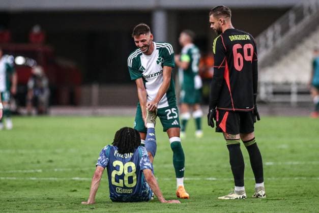 2024-08-08 Panathinaikos FC v AFC Ajax - Europa League Qualifier Third Round - 1st leg ATHENS, NETHERLANDS - AUGUST 8: Kian Fitz-Jim of AFC Ajax receives medical attention during the Europa League Qualifier Third Round - 1st leg match between Panathinaikos FC and AFC Ajax at Olympic Stadium Spyridon Louis on August 8, 2024 in Athens, Netherlands. Athens Olympic Stadium Spyridon Louis Netherlands Content not available for redistribution in The Netherlands directly or indirectly through any third parties. Copyright: xx