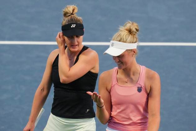August 9, 2024, Toronto, On, CAN: Gabriela Dabrowski of Canada (left) and doubles partner Erin Routliffe of Australia regroup during their match against Magda Linette of Poland and Peyton Stearns of the United States at the National Bank Open in Toronto on Friday, August 9, 2024. Gabriela Dabrowski  - ZUMAc35_ 20240809_zaf_c35_207 Copyright: xChrisxYoungx
