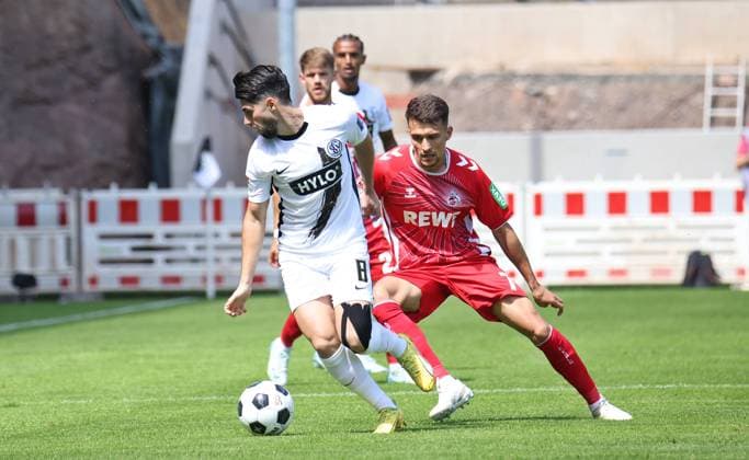 10.08.2024, Fussball, Herren, 2. Bundesliga, Saison 2024 2025, SV 07 Elversberg - 1. FC Köln, Semih Sahin (SV 07 Elversberg) Dejan Ljubicic (1. FC Köln) Elversberg Ursapharm-Arena an der Kaiserlinde Saarland Deutschland (DE)