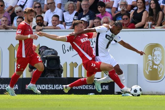 10.08.2024, Fussball, Herren, 2. Bundesliga, Saison 2024 2025, SV 07 Elversberg - 1. FC Köln, Filimon Gerezgiher (SV 07 Elversberg), Eric Martel (1. FC Koeln) Elversberg Ursapharm-Arena an der Kaiserlinde Saarland Deutschland (DE)