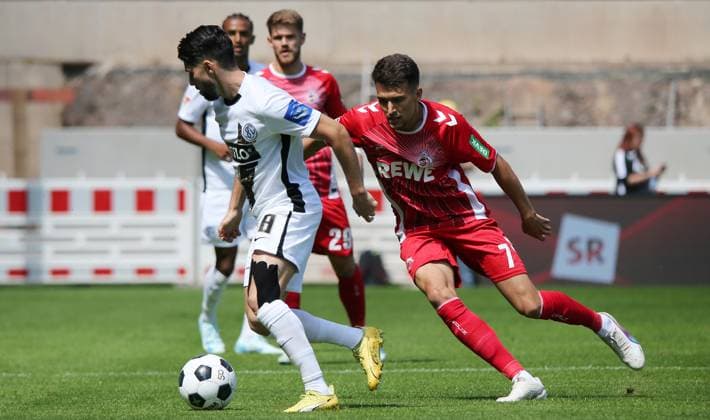10.08.2024, xmohx, Fussball 2.Bundesliga, SV Elversberg - 1.FC Köln emspor, v.l. Dejan Ljubicio (Köln), Semih Sahin (Elversberg) (DFL DFB REGULATIONS PROHIBIT ANY USE OF PHOTOGRAPHS as IMAGE SEQUENCES and or QUASI-VIDEO) Elversberg