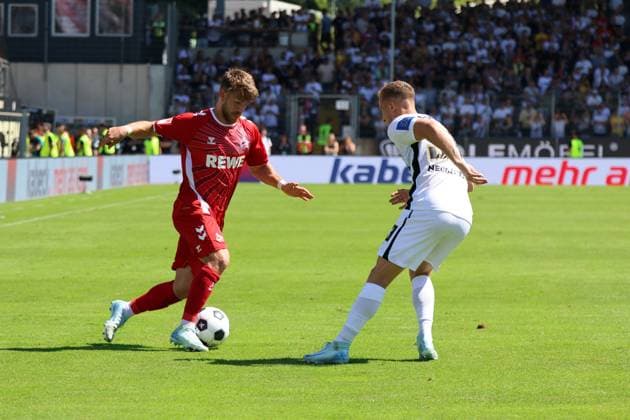 10.08.2024, Fussball, Herren, 2. Bundesliga, Saison 2024 2025, SV 07 Elversberg - 1. FC Köln, Maurice Neubauer (SV 07 Elversberg), Jan Thielmann (1. FC Koeln) Elversberg Ursapharm-Arena an der Kaiserlinde Saarland Deutschland (DE)