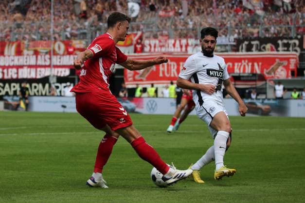 10.08.2024, xmohx, Fussball 2.Bundesliga, SV Elversberg - 1.FC Köln emspor, v.l. Linton Maina (Köln), Semih Sahin (Elversberg) (DFL DFB REGULATIONS PROHIBIT ANY USE OF PHOTOGRAPHS as IMAGE SEQUENCES and or QUASI-VIDEO) Elversberg
