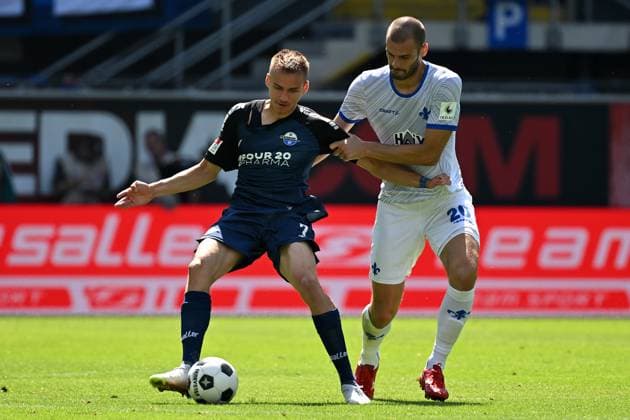 Paderborn, Home Deluxe Arena, 11.08.24, GER, Herren, 2.Bundesliga, Saison 2024-2025, SC Paderborn 07 - SV Darmstadt 98 Bild: v.li. im Zweikampf Filip BILBIJA (Paderborn) und Aleksandar VUKOTIC (Darmstadt) Only for editorial use! DFL regulations prohibit any use of photographs as image sequences and or quasi-video. NRW Deutschland
