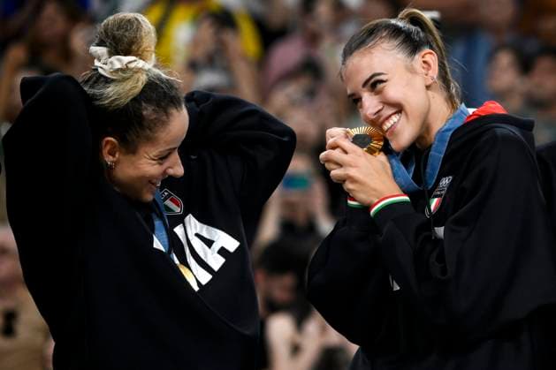 Italian players Monica de Gennaro and Alessia Orro celebrate at the end of the Volleyball gold medal match between United States of America and Italy of the Paris 2024 Olympic Games, Olympische Spiele, Olympia, OS at Arena Paris Sud 1 in Paris (France), August 11, 2024. Italy defeated United States 3-0 and won the gold medal.