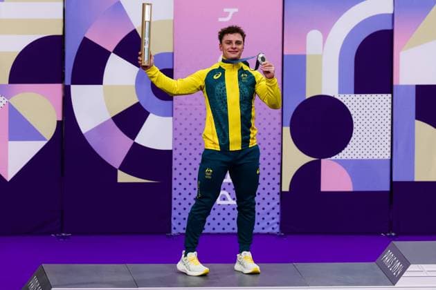 PARIS, FRANCE - AUGUST 11: Matthew Richardson of Team Australia celebrates winning Silver on the Podium in the Men™s Keirin Final during the Cycling Track Paris 2024 Olympic Games, Olympische Spiele, Olympia, OS at the National Veladrome on August 11, 2024 in Paris, France. (Photo by Pete Dovgan Speed Media Icon Sportswire) OLYMPICS: AUG 11 Paris 2024 EDITORIAL USE ONLY Icon2408110195