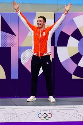 PARIS, FRANCE - AUGUST 11: Harrie Lavreysen of Team Netherlands celebrates winning Gold on the Podium in the Men™s Keirin Final during the Cycling Track Paris 2024 Olympic Games, Olympische Spiele, Olympia, OS at the National Veladrome on August 11, 2024 in Paris, France. (Photo by Pete Dovgan Speed Media Icon Sportswire) OLYMPICS: AUG 11 Paris 2024 EDITORIAL USE ONLY Icon2408110200