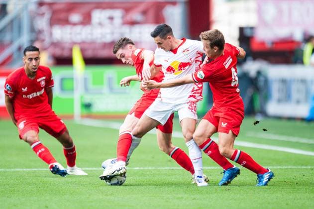 13.08.2024 - Fußball, 2024 2025, Champions League Qualifikation, 3. Runde, FC Twente Enschede - RB Salzburg: (L-R) Daan Rots (Enschede), Oscar Gloukh (Salzburg), Mathias Kjölö Kjolo (Enschede)