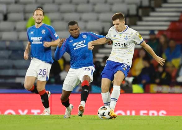 Rangers v FC Dynamo Kyiv UEFA Champions League Dujon Sterling of Rangers (middle) competes for the ball with Oleksandr Pikhalyonok of FC Dynamo Kyiv during the UEFA Champions League Third Qualifying Round Second Leg match at Hampden Park, Glasgow UK Newspapers OUT Copyright: xFredxPalmerx FIL-20489-0112