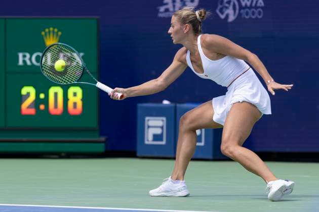 August 13, 2024, Mason, Oh, USA: 2024 Cincinnati Open Tennis, 2024 08 13 - Marta Kostyuk hits a ball against opponent Elise Mertens. ZUMAPress Mason USA - ZUMAn24_ 20240813_zaf_n24_072 Copyright: xWallyxNellx