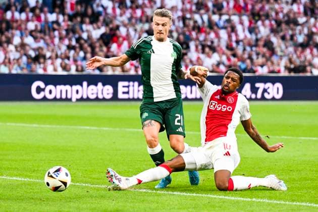 AMSTERDAM - Tin Jedvaj of Panathinaikos, Chuba Akpom of Ajax (l-r) during the 3rd qualifying round UEFA Europa League match between Ajax and Panathinaikos at the Johan Cruijff ArenA on August 15, 2024 in Amsterdam. ANP OLAF KRAAK Ajax Amsterdam v Panathinaikos 2024 35 xVIxANPxSportx xxANPxIVx 506070542 originalFilename: 506070542.jpg