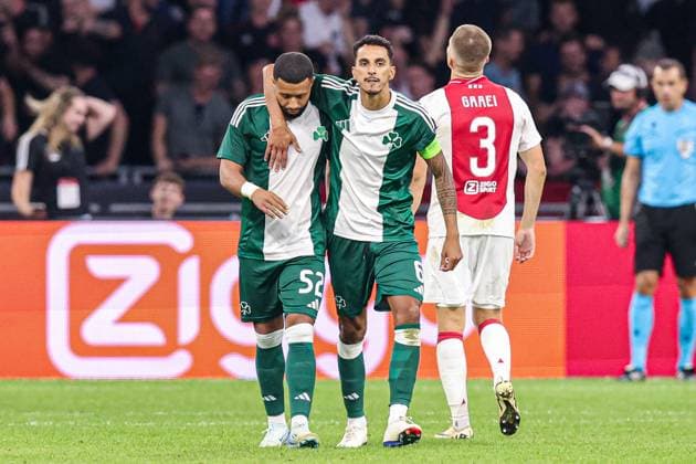2024-08-15 AFC Ajax v Panathinaikos FC - UEFA Champions League Third Qualifying Round 2nd Leg AMSTERDAM, NETHERLANDS - AUGUST 15: Tonny Vilhena of Panathinaikos FC, Carlos Zeca of Panathinaikos FC disappointed after missing the penalty during the UEFA Champions League Third Qualifying Round 2nd Leg match between AFC Ajax and Panathinaikos FC at Johan Cruijff ArenA on August 15, 2024 in Amsterdam, Netherlands. (Photo by Peter Lous BSR Agency) Amsterdam Netherlands Content not available for redistribution in The Netherlands directly or indirectly through any third parties. Copyright: xBSRxAgencyx