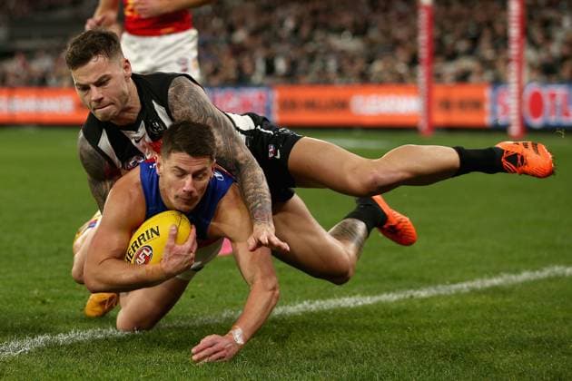 Sport Themen der Woche KW33 Sport Bilder des Tages AFL MAGPIES LIONS, Dayne Zorko of the Lions is tackled during the AFL Round 23 match between the Collingwood Magpies and the Brisbane Lions at the Melbourne Cricket Ground Saturday, August 17, 2024. ( NO ARCHIVING, EDITORIAL USE ONLY, NO USE IN BOOKS WITHOUT CONSENT MELBOURNE VICTORIA AUSTRALIA  Copyright: xROBxPREZIOSOx 20240817173489446652