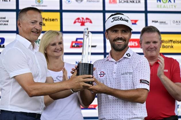 David Ravetto of France, right, celebrates after winning the Czech Masters golf tournament of DP World Tour European series in Nebrenice, Czech Republic, August 18, 2024. (CTKxPhoto RomanxVondrous) CTKPhotoP2024081802847  CTKPhotoP2024081802847