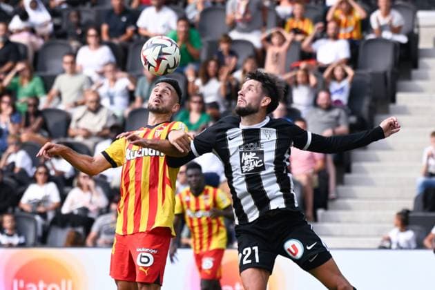 Adrien THOMASSON ( 28 - Lens ) and Jordan LEFORT ( 21 - Angers ) during the Ligue 1 match between Angers SCO and RC Lens at Stade Raymond Kopa on August 18, 2024 in Angers, France. ( Photo by federico pestellini panoramic ) - FOOTBALL : Angers vs Lens - Ligue 1 - 18 08 2024 FedericoPestellini Panoramic 