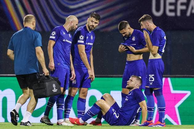 GNK Dinamo Zagreb v Qarabag - UEFA Champions Qualifying Play-Off: First Leg ZAGREB, CROATIA - AUGUST 20: Stefan Ristovski of Dinamo Zagreb lies injured on a pitch during the UEFA Champions Qualifying Play-Off First Leg match between GNK Dinamo Zagreb and Qarabag at Stadion Maksimir on August 20, 2024 in Zagreb, Croatia.  LukaxStanzl PIXSELL