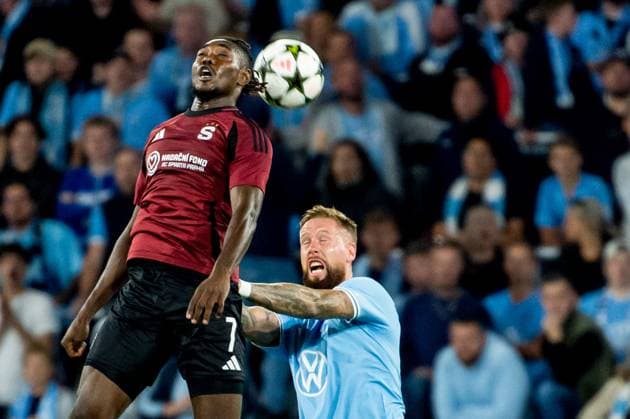 240821 Victor Olatunji of Sparta Prag and Pontus Jansson of Malmö FF during the UEFA Champions League football match between Malmö FF and Sparta Prag on August 21, 2024 in Malmö. Photo: Christian Örnberg BILDBYRAN COP 166 CO0456 fotboll football soccer fotball champions league malmö ff sparta prag bbeng play-off bbauto Copyright: CHRISTIANxÖRNBERG BB240821CO038