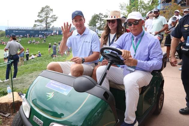 CASTLE ROCK, CO - AUGUST 21: NFL, American Football Herren, USA Hall of Fame quarterback Peyton Manning leaves on a golf cart with his wife Ashley Manning after finishing on the 18th hole during the PGA, Golf Herren FedExCup BMW Championship Pro Am on August 21st, 2024, at Castle Pines Golf Club in Castle Rock, Colorado. (Photo by Brian Spurlock Icon Sportswire) GOLF: AUG 21 PGA FedExCup Playoffs - BMW Championship Pro Am EDITORIAL USE ONLY Icon24082113