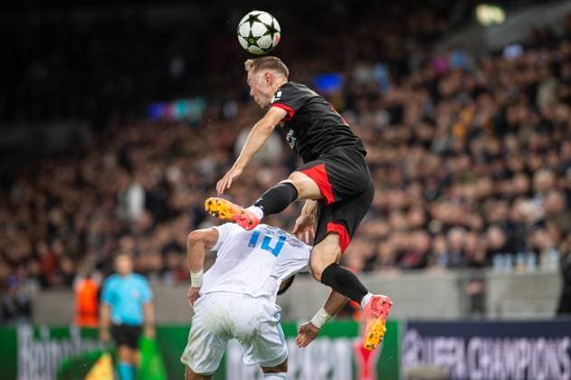 FC Midtjylland v Slovan Bratislava, UEFA Champions League qualification, Herning, Denmark Herning, Denmark. 21st, August 2024. Joel Andersson (6) of FC Midtjylland and Marko Tolic (10) of Slovan Bratislava seen during the UEFA Champions League qualification match between FC Midtjylland and Slovan Bratislava at MCH Arena in Herning. Herning Denmark  Copyright: xGonzalesxPhoto MortenxKjaerx