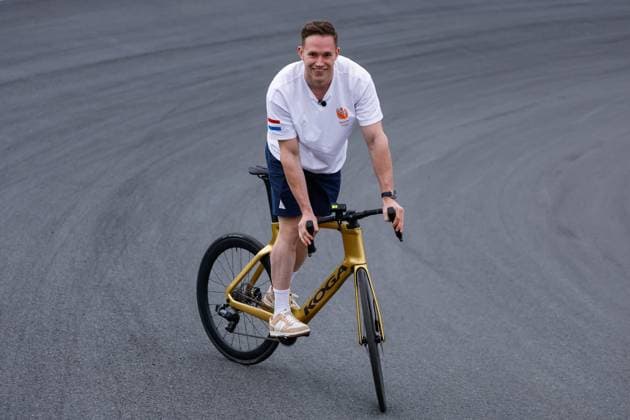 Harry Lavreysen dutch olympic champion track cyclist on his golden bike shows his three golden medals during previews ahead of the F1 Grand Prix of Netherlands at Circuit Park Zandvoort on August 22, 2024 in Zandvoort, Netherlands. Defodi-704_MTB20240822F1ZandvoortDag1352513