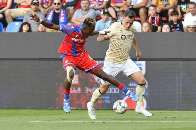 Sampson Dweh of Plzen, left, and Lawrence Shankland of Heart in action during the football European League 4th qualifying round opening match Viktoria Plzen vs Heart of Midlothian in Pilsen, Czech Republic, August 22, 2024. (CTKxPhoto MiroslavxChaloupka) CTKPhotoP2024082207052  CTKPhotoP2024082207052
