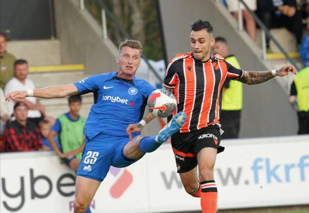 22.08.2024, Riga, Latvia. Latvia™s RFS Petr Mares (left) vies for the ball with Cyprus™ APOEL Anastasios Donis during their UEFA Europa League play offs game between RFS (Latvia) and APOEL (Cyprus). Foto: Roman Koksarov Riga Latvia Copyright: xRomÄnsxKokÅ¡arovsx soc_RFS-APOEL20240822rk227.JPG