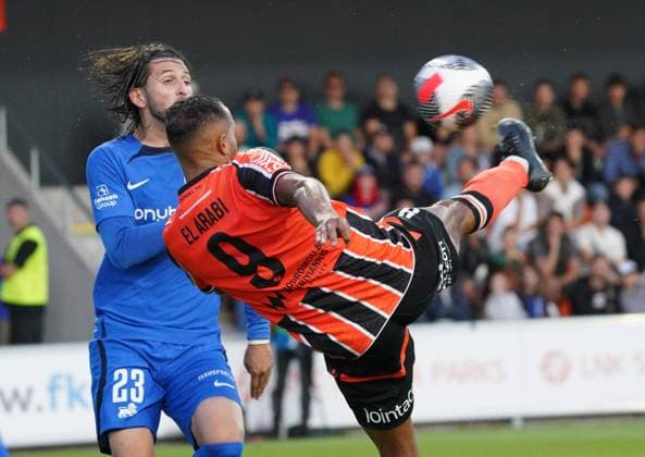 22.08.2024, Riga, Latvia. Latvia™s RFS Herdi Prenga (left) vies for the ball with Cyprus™ APOEL El-Arabi Youssef during their UEFA Europa League play offs game between RFS (Latvia) and APOEL (Cyprus). Foto: Roman Koksarov Riga Latvia Copyright: xRomÄnsxKokÅ¡arovsx soc_RFS-APOEL20240822rk432.JPG