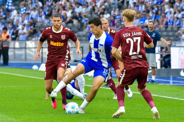 24.08.2024, xlakx, Fussball 2.Bundesliga, Hertha BSC Berlin - Jahn Regensburg emspor, v.l. Oscar Schoenfelder (SSV Jahn Regensburg 7),Ibrahim Maza (Hertha BSC 10),Dominik Kother (SSV Jahn Regensburg 27),Zweikampf, Duell, Kampf, tackle (DFL DFB REGULATIONS PROHIBIT ANY USE OF PHOTOGRAPHS as IMAGE SEQUENCES and or QUASI-VIDEO) Daniel Lakomski Jan Huebner Berlin