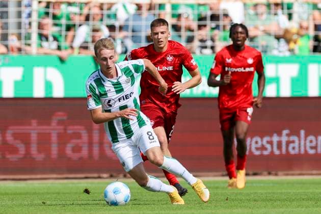 Joshua Mees (SC Preussen Muenster) und Erik Wekesser (1. FC Kaiserslautern) kaempfen um den Ball, 2. Bundesliga, Preußen Münster vs 1. FC Kaiserslautern, Preußenstadion am 24. August 2024 in Münster, Deutschland. (Foto von Marco Steinbrenner DeFodi Images) Joshua Mees (SC Preussen Muenster) und Erik Wekesser (1. FC Kaiserslautern) battle for the ball, 2. Bundesliga, Preußen Münster vs 1. FC Kaiserslautern, Preußenstadion, August 24, 2024 in Münster, Germany. (Photo by Marco Steinbrenner DeFodi Images) DFB DFL REGULATIONS PROHIBIT ANY USE OF PHOTOGRAPHS AS IMAGE SEQUENCES AND OR QUASI-VIDEO. Defodi-700_scp_fcK_20240824_028