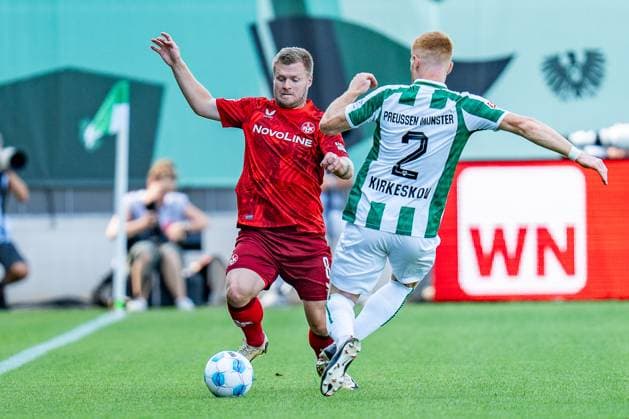 24.08.2024, SC Preußen Münster vs. 1. FC Kaiserslautern, 2. Bundesliga, 3. Spieltag Jean Zimmer (1. FC Kaiserslautern, 8) Mikkel Kirkeskov (Preussen Muenster, 2) Wichtiger Hinweis: Gemaess den Vorgaben der DFL Deutsche Fussball Liga bzw. des DFB Deutscher Fussball-Bund ist es untersagt, in dem Stadion und oder vom Spiel angefertigte Fotoaufnahmen in Form von Sequenzbildern und oder videoaehnlichen Fotostrecken zu verwerten Foto: Bahho Kara Kirchner-Media