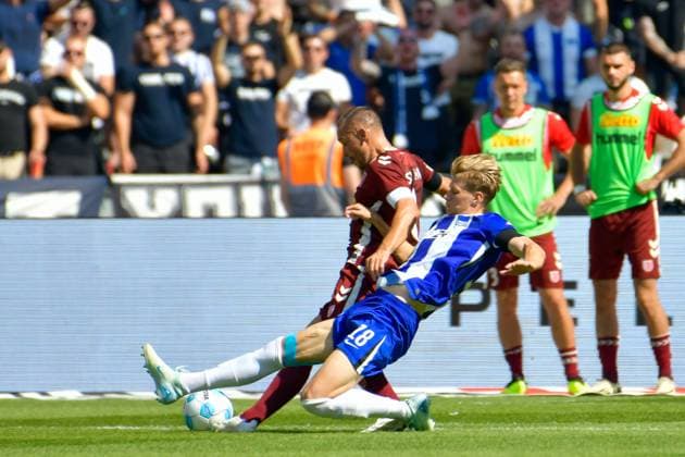 24.08.2024, xlakx, Fussball 2.Bundesliga, Hertha BSC Berlin - Jahn Regensburg emspor, v.l. Andreas Geipl (SSV Jahn Regensburg 8),Luca Schuler(Hertha BSC 18),Zweikampf, Duell, Kampf, tackle (DFL DFB REGULATIONS PROHIBIT ANY USE OF PHOTOGRAPHS as IMAGE SEQUENCES and or QUASI-VIDEO) Daniel Lakomski Jan Huebner Berlin