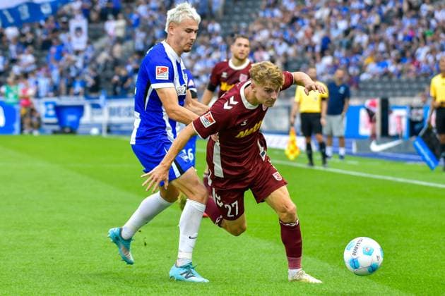 24.08.2024, xlakx, Fussball 2.Bundesliga, Hertha BSC Berlin - Jahn Regensburg emspor, v.l. Marten Winkler (Hertha BSC 22),Dominik Kother (SSV Jahn Regensburg 27),Zweikampf, Duell, Kampf, tackle (DFL DFB REGULATIONS PROHIBIT ANY USE OF PHOTOGRAPHS as IMAGE SEQUENCES and or QUASI-VIDEO) Daniel Lakomski Jan Huebner Berlin