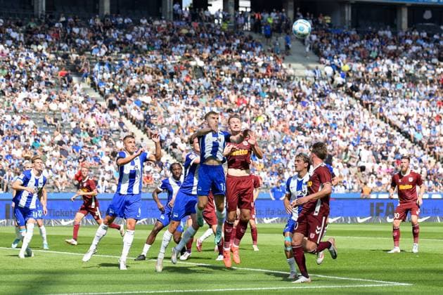 24.08.2024, xlakx, Fussball 2.Bundesliga, Hertha BSC Berlin - Jahn Regensburg emspor, v.l. Jonjoe Kenny(Hertha BSC 16),Florian Ballas (SSV Jahn Regensburg 4),zum Kopfball (DFL DFB REGULATIONS PROHIBIT ANY USE OF PHOTOGRAPHS as IMAGE SEQUENCES and or QUASI-VIDEO) Daniel Lakomski Jan Huebner Berlin