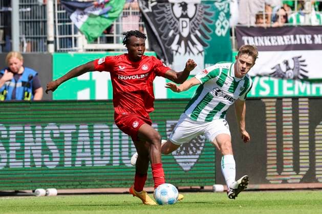 Dickson Abiama (1. FC Kaiserslautern) und Jano Ter Horst (SC Preussen Muenster) kaempfen um den Ball, 2. Bundesliga, Preußen Münster vs 1. FC Kaiserslautern, Preußenstadion am 24. August 2024 in Münster, Deutschland. (Foto von Marco Steinbrenner DeFodi Images) Dickson Abiama (1. FC Kaiserslautern) und Jano Ter Horst (SC Preussen Muenster) battle for the ball, 2. Bundesliga, Preußen Münster vs 1. FC Kaiserslautern, Preußenstadion, August 24, 2024 in Münster, Germany. (Photo by Marco Steinbrenner DeFodi Images) DFB DFL REGULATIONS PROHIBIT ANY USE OF PHOTOGRAPHS AS IMAGE SEQUENCES AND OR QUASI-VIDEO. Defodi-700_scp_fcK_20240824_044