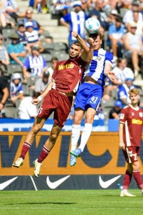 24.08.2024, xlakx, Fussball 2.Bundesliga, Hertha BSC Berlin - Jahn Regensburg emspor, v.l. Rasim Bulic (SSV Jahn Regensburg 5),Pascal Klemens (Hertha BSC 41),Zweikampf, Duell, Kampf, tackle (DFL DFB REGULATIONS PROHIBIT ANY USE OF PHOTOGRAPHS as IMAGE SEQUENCES and or QUASI-VIDEO) Daniel Lakomski Jan Huebner Berlin