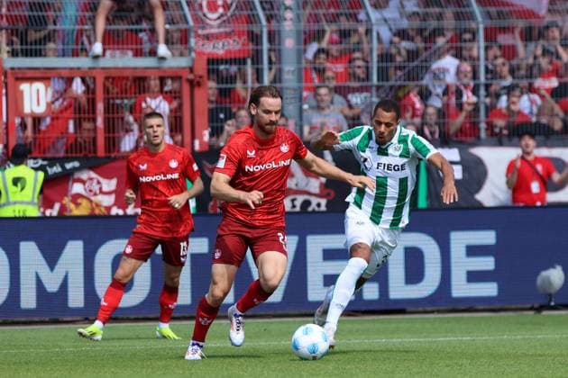 GER, Preussen Muenster gegen 1.FC Kaiserslautern, Fussball, 2.Liga, 3. Spieltag, Spielzeit 2024 2025, 24.08.2024 Etienne Amenyido Joel Grodowski (Preussen Muenster, 30) Jannis Heuer (1.FC Kaiserslautern, 24) DFL REGULATIONS PROHIBIT ANY USE OF PHOTOGRAPHS AS IMAGE SEQUENCES AND OR QUASI-VIDEO GER, Preussen Muenster gegen 1.FC Kaiserslautern, Fussball, 2.Liga, 3. Spieltag, Spielzeit 2024 2025, 24.08.2024 Muenster