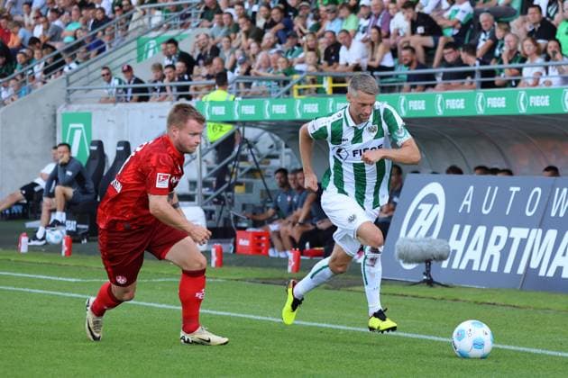 GER, Preussen Muenster gegen 1.FC Kaiserslautern, Fussball, 2.Liga, 3. Spieltag, Spielzeit 2024 2025, 24.08.2024 Jean Zimmer (1.FC Kaiserslautern, 8) Marc Lorenz (Preussen Muenster, 18) DFL REGULATIONS PROHIBIT ANY USE OF PHOTOGRAPHS AS IMAGE SEQUENCES AND OR QUASI-VIDEO GER, Preussen Muenster gegen 1.FC Kaiserslautern, Fussball, 2.Liga, 3. Spieltag, Spielzeit 2024 2025, 24.08.2024 Muenster