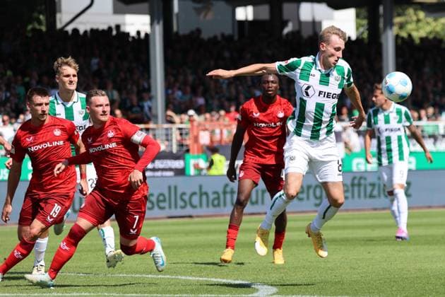 GER, Preussen Muenster gegen 1.FC Kaiserslautern, Fussball, 2.Liga, 3. Spieltag, Spielzeit 2024 2025, 24.08.2024 Joshua Mees Joel Grodowski (Preussen Muenster, 8) DFL REGULATIONS PROHIBIT ANY USE OF PHOTOGRAPHS AS IMAGE SEQUENCES AND OR QUASI-VIDEO GER, Preussen Muenster gegen 1.FC Kaiserslautern, Fussball, 2.Liga, 3. Spieltag, Spielzeit 2024 2025, 24.08.2024 Muenster