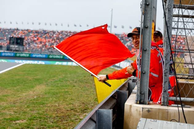 Marshal waves red flag, F1 Grand Prix of the Netherlands at Circuit Zandvoort on August 24, 2024 in Zandvoort, Netherlands. (Photo by HOCH ZWEI) Zandvoort Netherlands